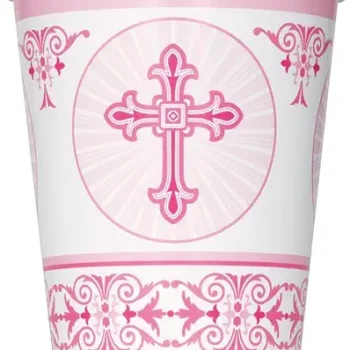 A white cup with pink religious cross designs and decorative patterns.
