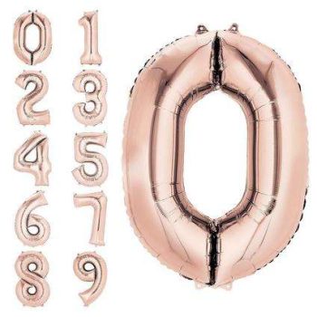 A rose gold foil balloon shaped like the number zero.