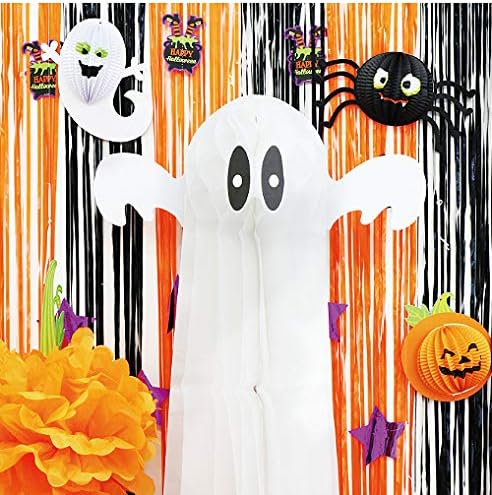 Halloween decorations with ghost and pumpkin.